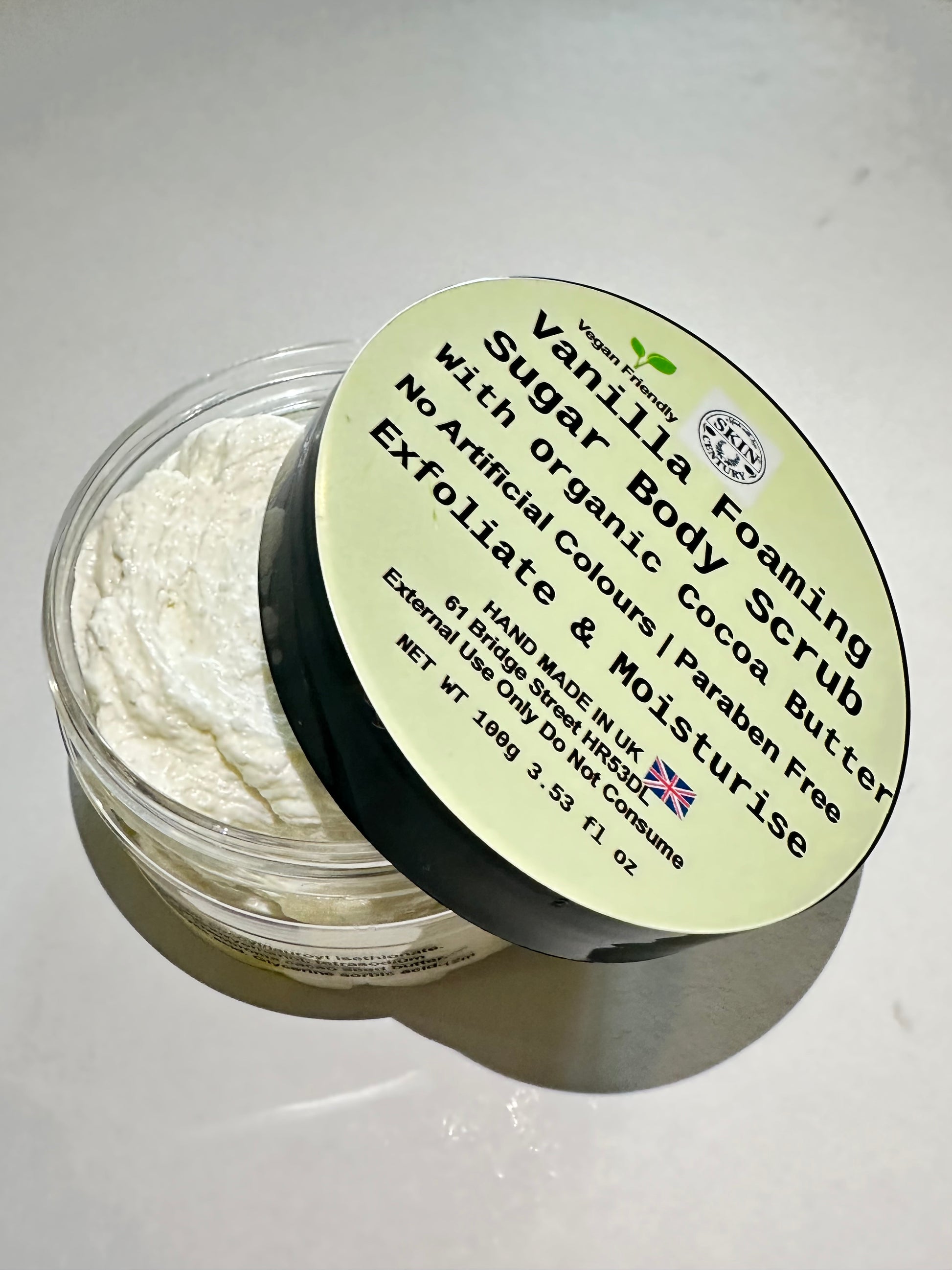 Handcrafted exfoliating sugar scrub with vanilla scent